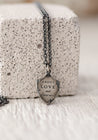 'About Love and Other Tales' Silver Shield Pendant Necklace | TÓ GARAL