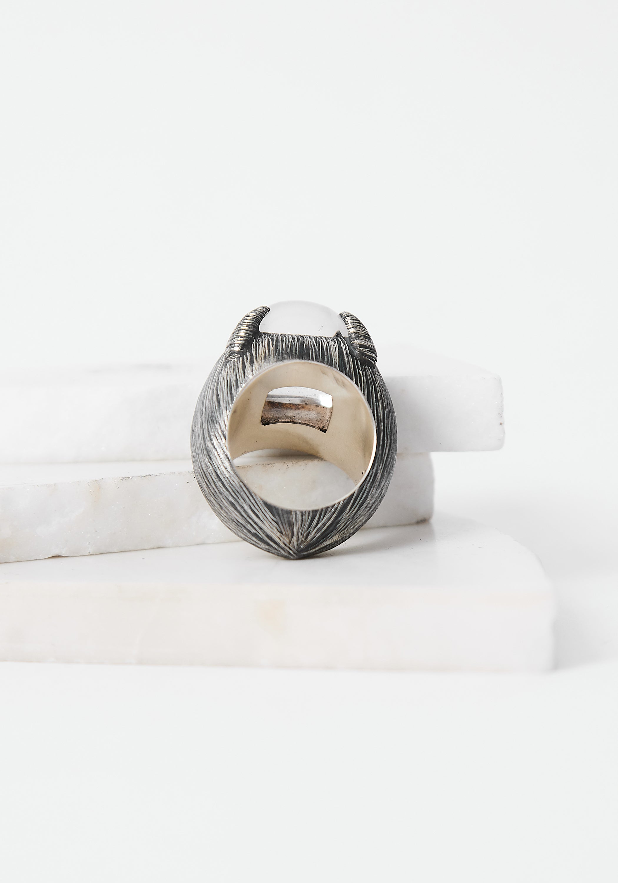 Grasping Light Oxidized Sterling and Carved Crystal Ring