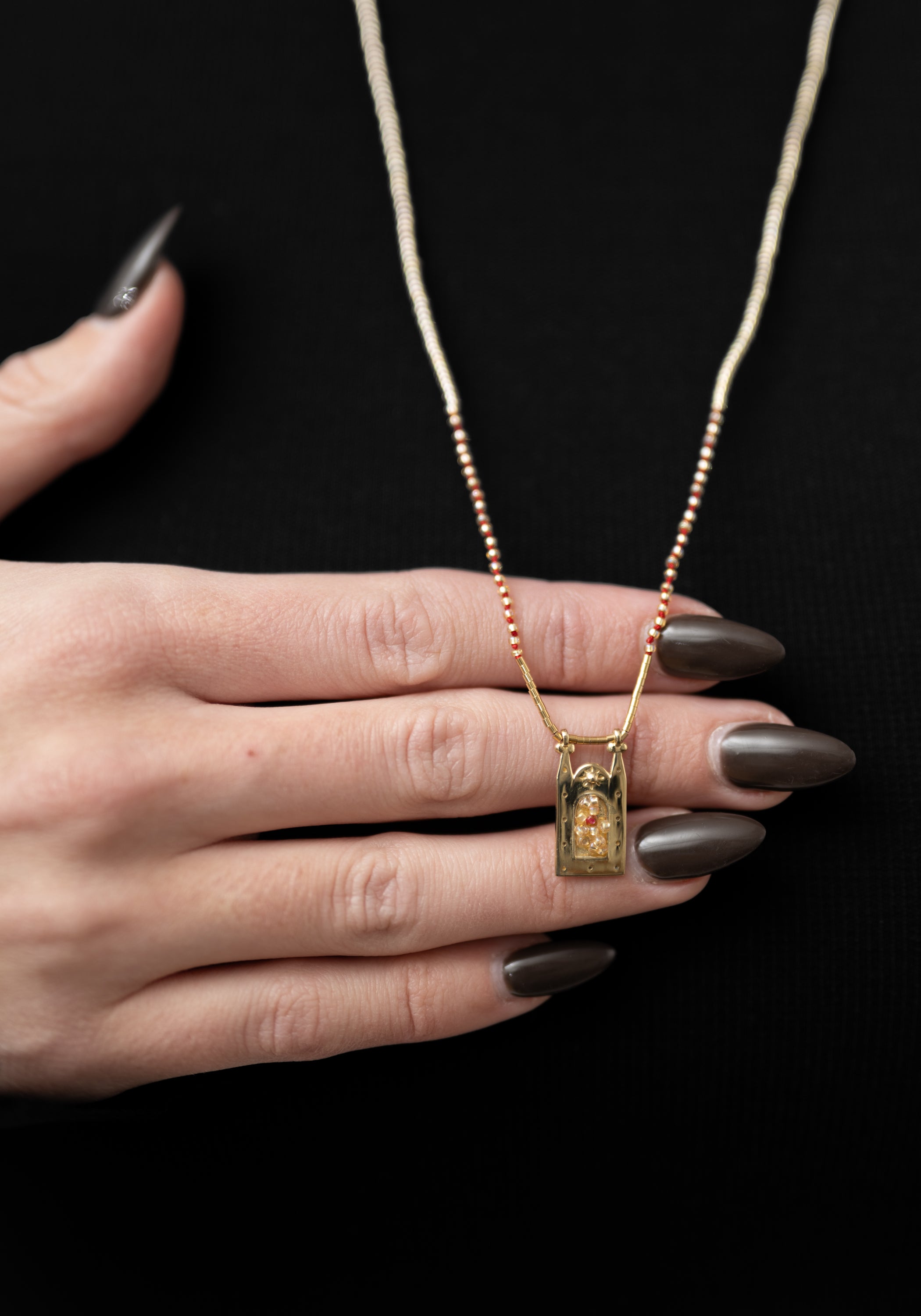 Brass Phoenix Bead Filled Frame Necklace