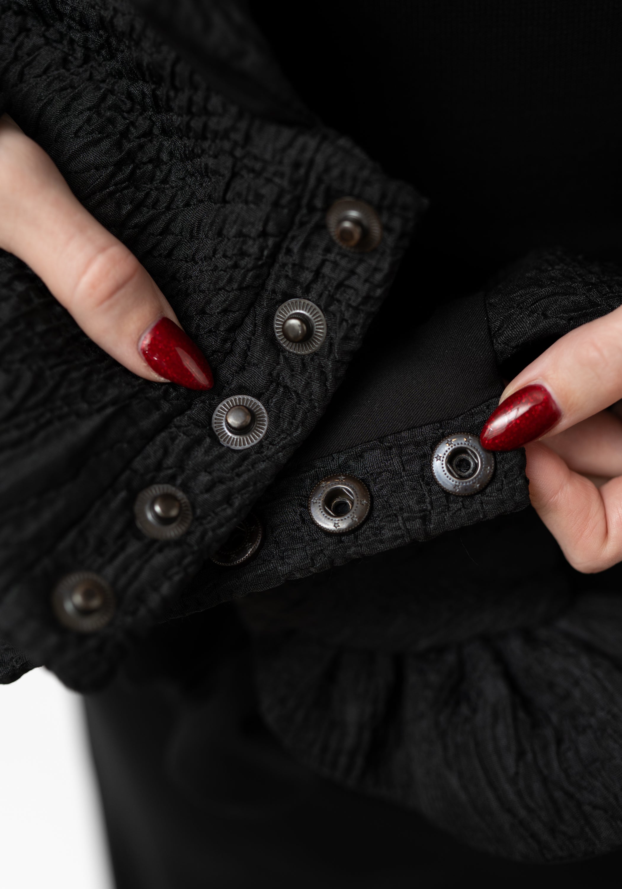 Black Quilted Ruffle Shoulder Piece