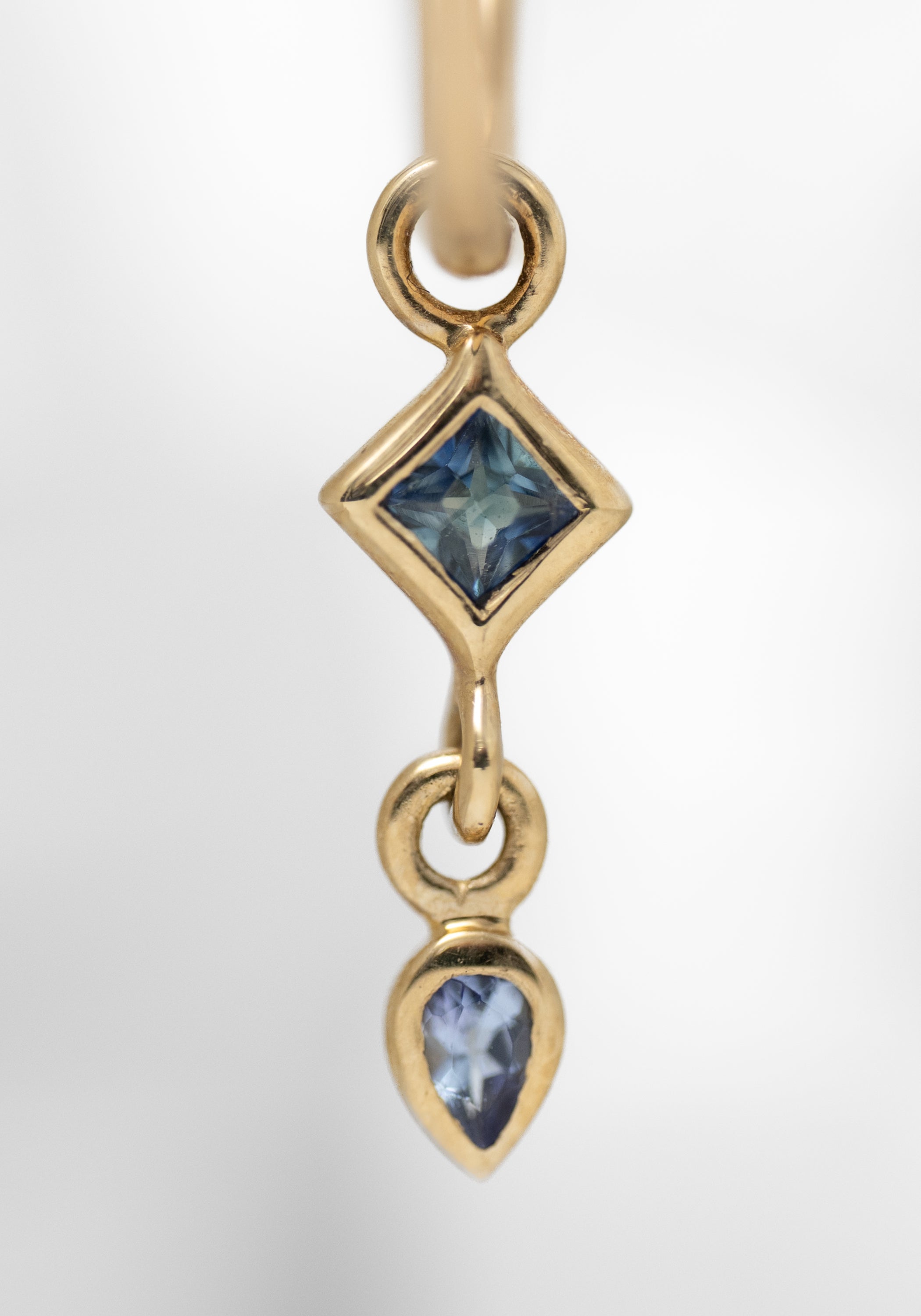 Single 9k Gold Blue Sapphire, Tanzanite and Large Round Clicker Hoop