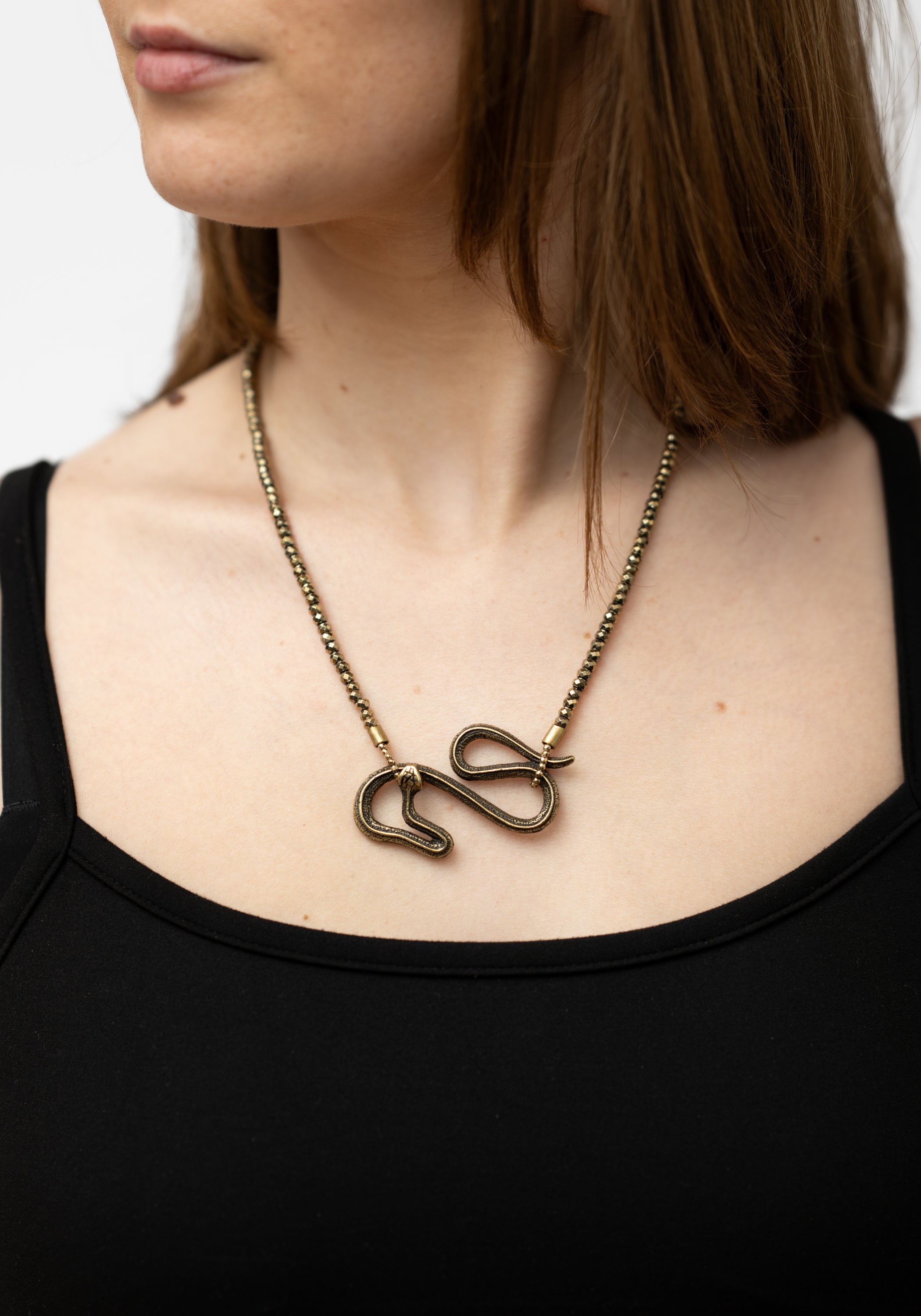 Hematite and Brass Snake Necklace - December Thieves