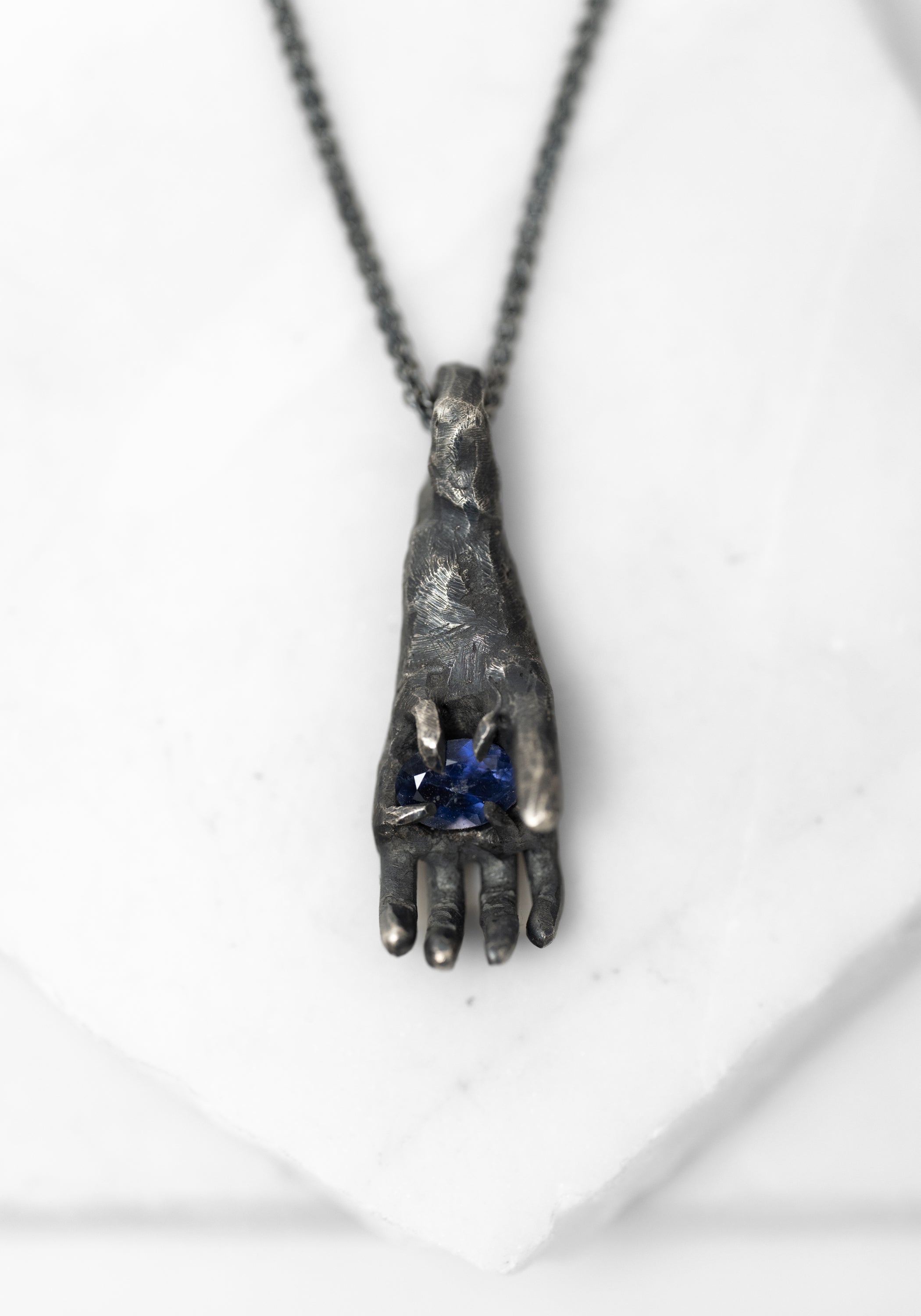 Oxidized Sterling Hand Holding Iolite Necklace - December Thieves