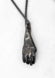 Oxidized Sterling Hand Holding Triangle Amethyst Necklace - December Thieves