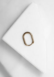 Single 9k Gold Oval Clicker Hoop - December Thieves