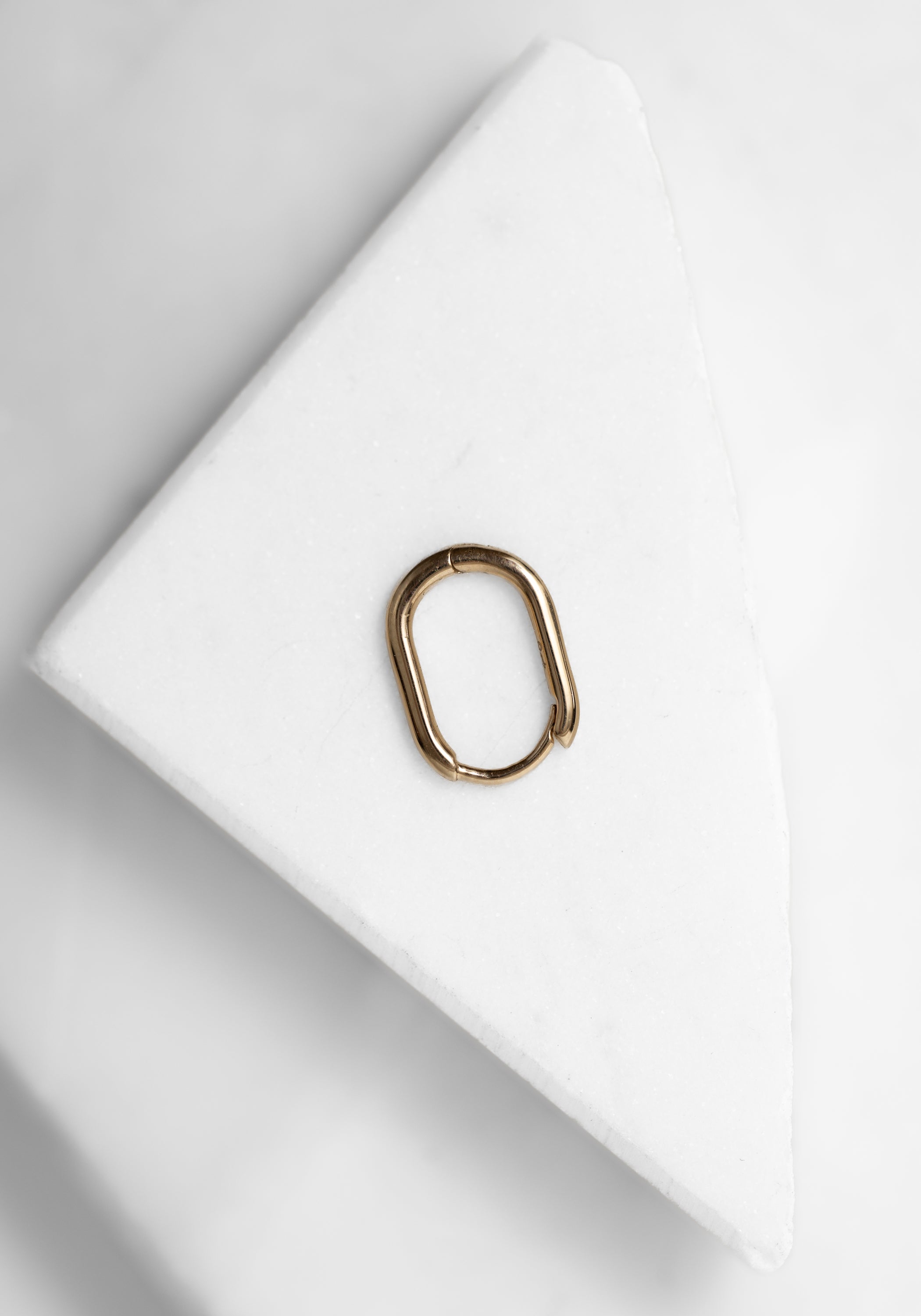 Single 9k Gold Oval Clicker Hoop - December Thieves