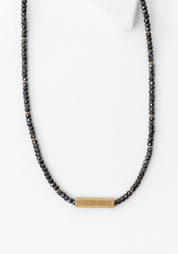 Dainty Black Zirconium and Brass Hex Bolt Necklace