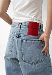 Oversized Distressed Bolo Jeans